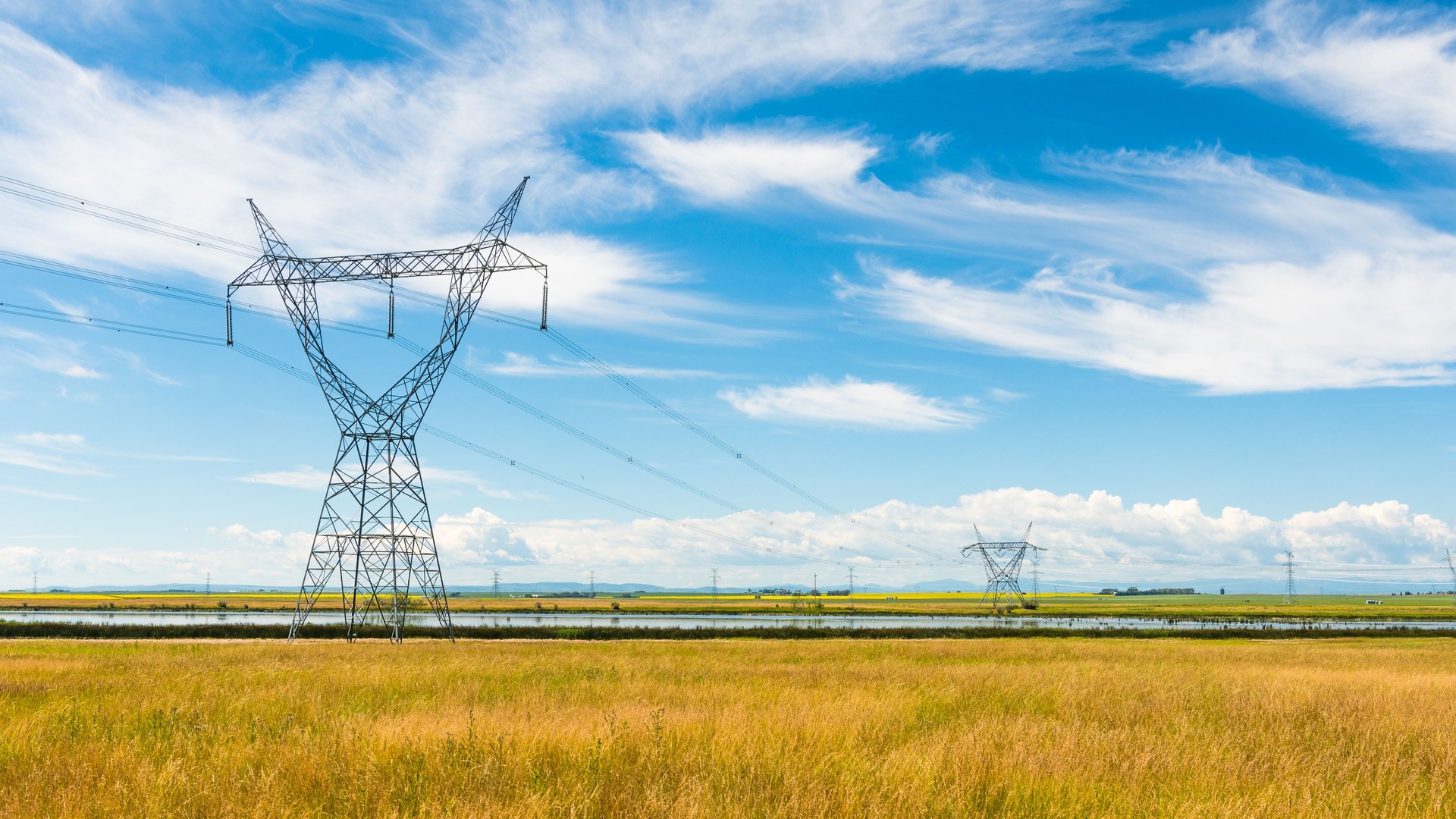 Power Lines in Rural Alberta Prairies Grassland Landscape Background